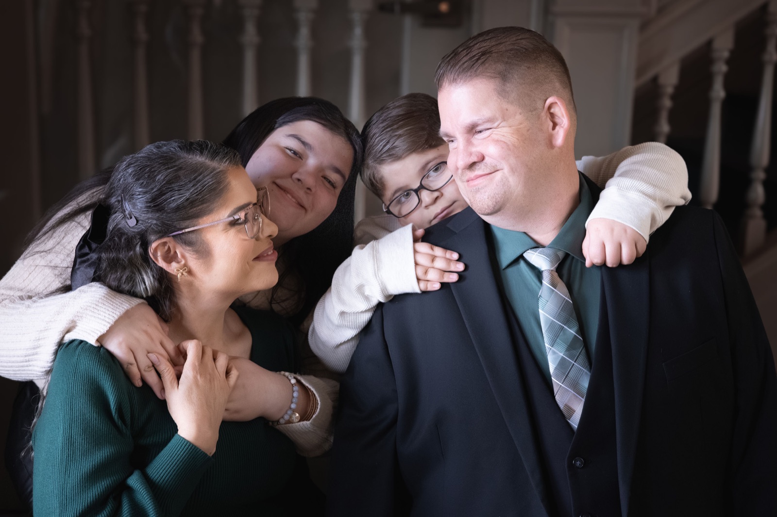 Family members embracing together